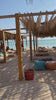 Pan across chill-out area on beach, Egypt